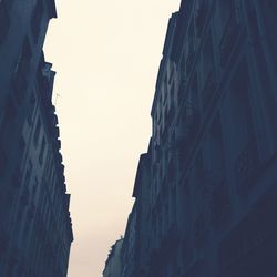 Low angle view of buildings against clear sky