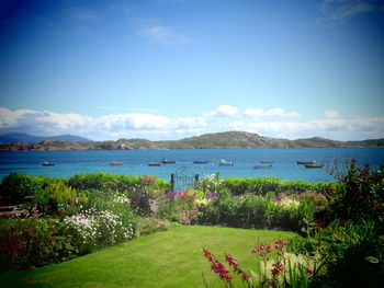 Scenic view of calm lake against mountain range