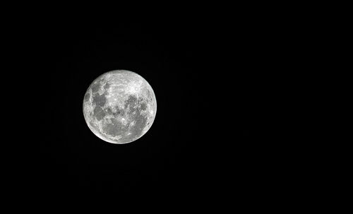 Low angle view of moon in sky