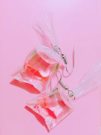 Close-up of pink flower over white background