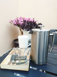 Close-up of flower pot on table at home