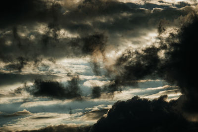 Low angle view of dramatic sky during sunset