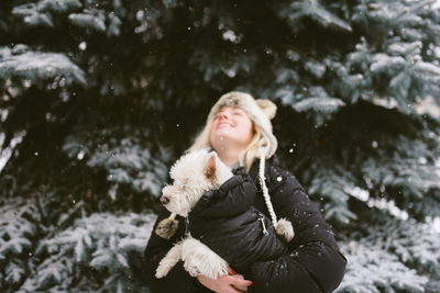 Full length of woman in snow