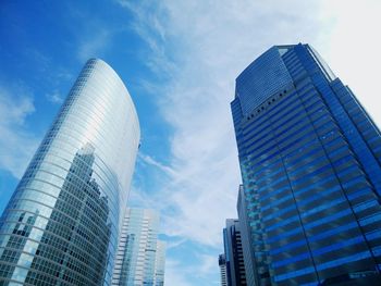 Low angle view of modern buildings against sky