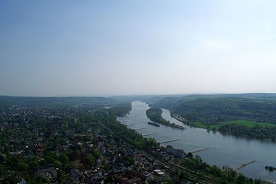 High angle view of bridge over river amidst buildings in city