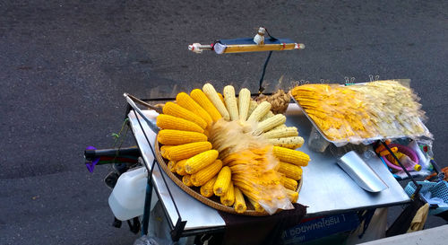 High angle view of corns for sale on street
