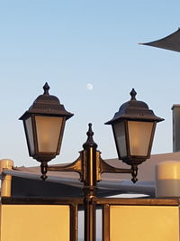 Low angle view of street light against clear sky