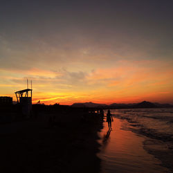 Scenic view of sea at sunset