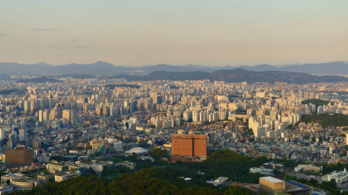 High angle view of townscape against sky at sunset