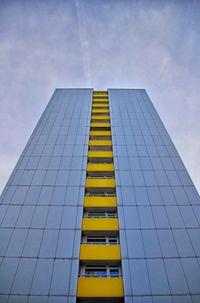 Low angle view of skyscraper against sky