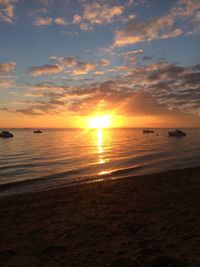 Scenic view of sea at sunset