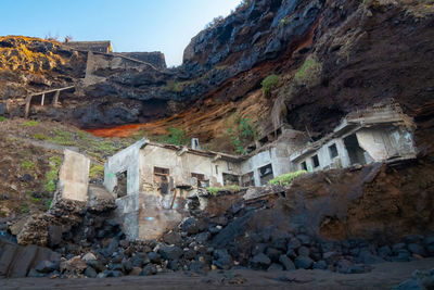 Low angle view of old buildings against sky