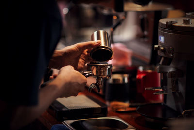 Man working with coffee cup