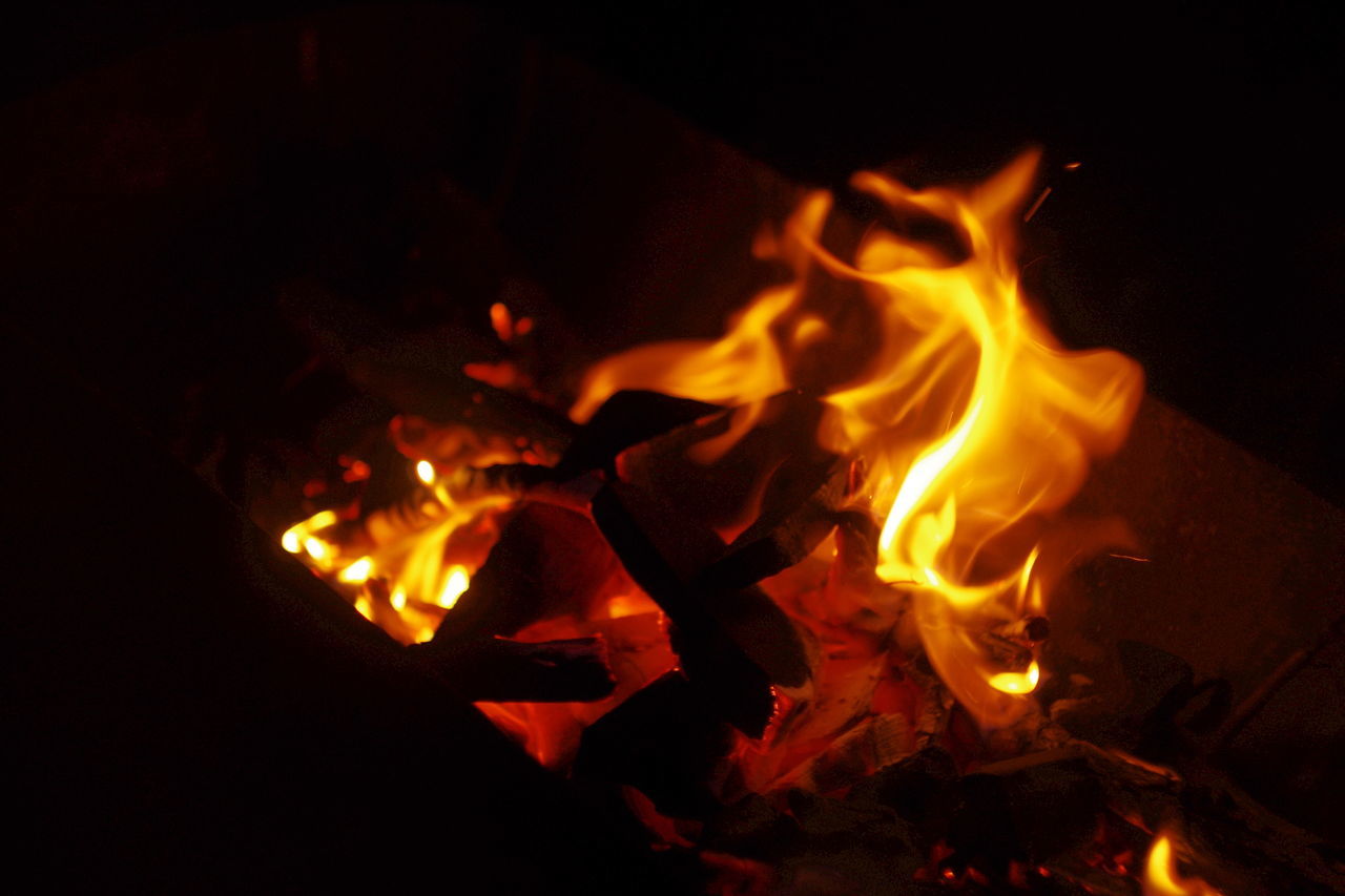 burning, flame, fire - natural phenomenon, heat - temperature, night, glowing, bonfire, firewood, fire, campfire, illuminated, heat, motion, orange color, dark, close-up, light - natural phenomenon, long exposure, no people, yellow