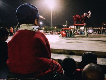 Woman standing at night