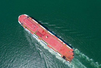 High angle view of red ship on sea