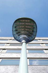 Low angle view of built structure against blue sky