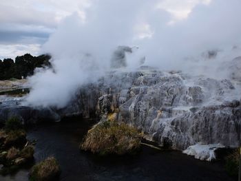 View of volcanic landscape against sky