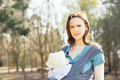 Portrait of a beautiful young woman looking away