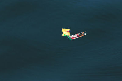 High angle view of toy floating on water