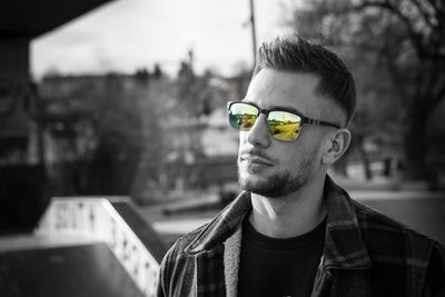 Portrait of young man wearing sunglasses