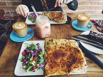 Close-up of breakfast served on table