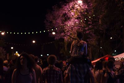 People enjoying at concert