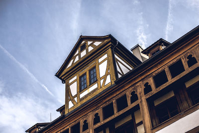 Low angle view of old building against sky