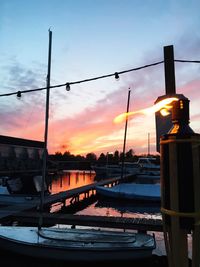 View of harbor at sunset