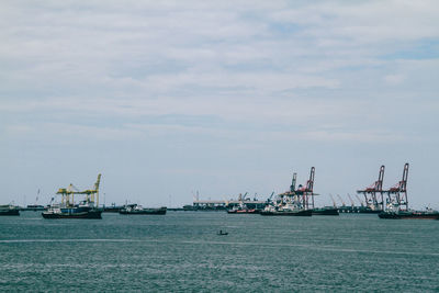 Nautical vessel on sea against sky