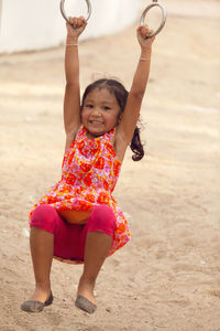 Portrait of happy girl on beach