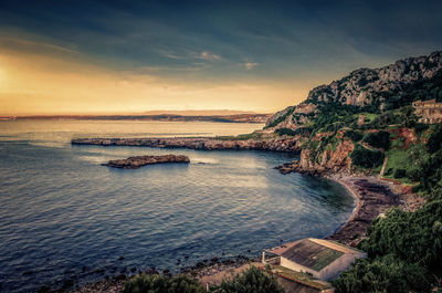 Scenic view of sea against sky during sunset