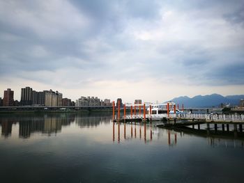 View of buildings against cloudy sky