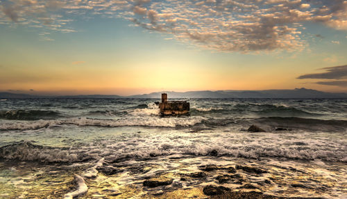 Scenic view of sea against sky during sunset