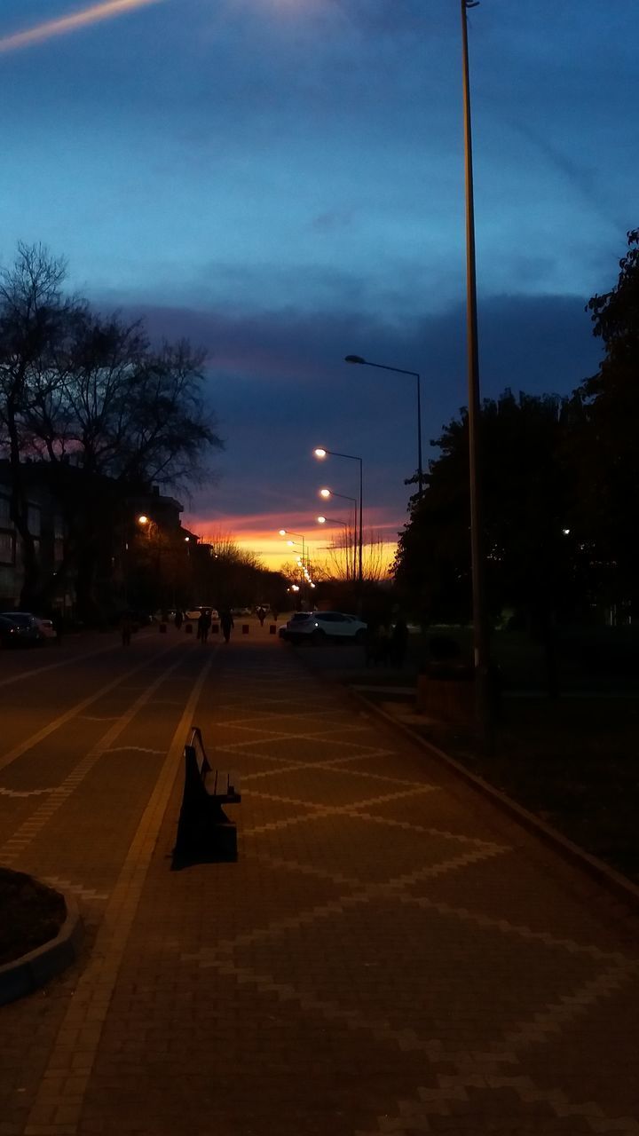 ILLUMINATED STREET LIGHTS AT NIGHT