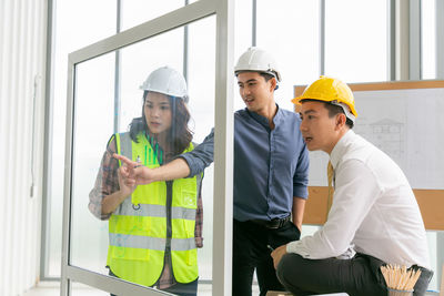 Young man working in mirror