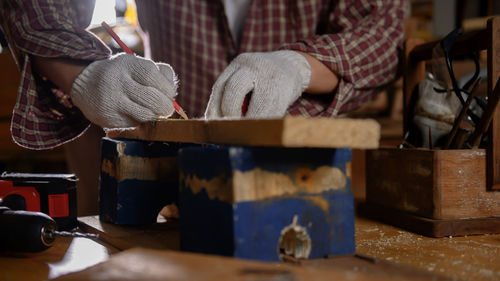 Midsection of man preparing food