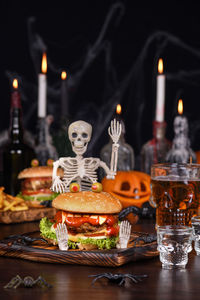 Monster burger on a sitting skeleton will definitely lift your spirits and is the halloween part