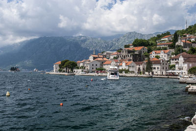 Quiet embankment in montenegro on the shores of the adriatic sea and cozy cafes.