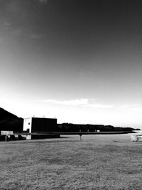 Scenic view of farm against sky