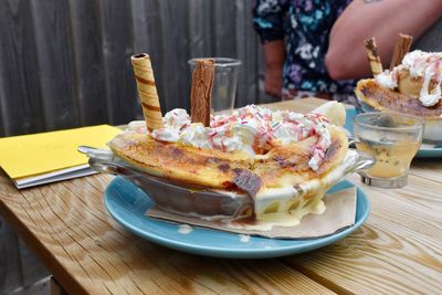 Banana split with ice cream on a table 