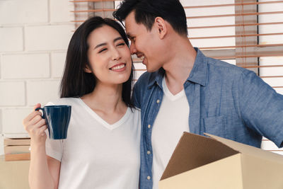 Portrait of a smiling young couple