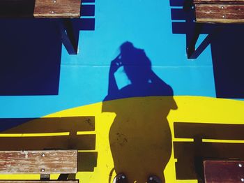 Close-up of yellow shadow on water