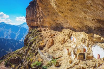 Panoramic view of rock formations against sky