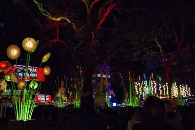 Illuminated street light at night