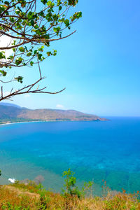 Scenic view of sea against clear blue sky