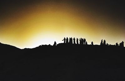 Scenic view of landscape against sky at sunset