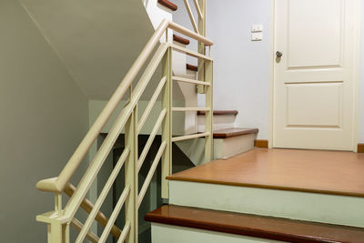 Low angle view of spiral staircase in building