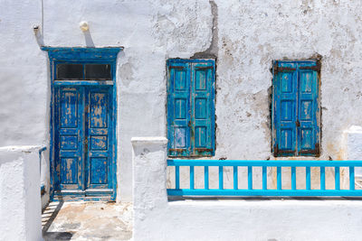 Closed blue door of building