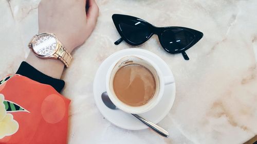 High angle view of coffee cup on table